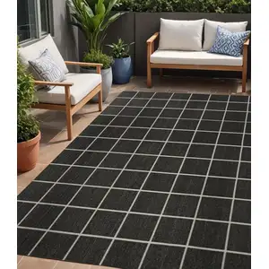 Photo of Dark Gray And Cream Plaid Indoor Outdoor Area Rug