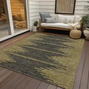 Photo of Dark Gray And Gold Abstract Washable Indoor Outdoor Area Rug