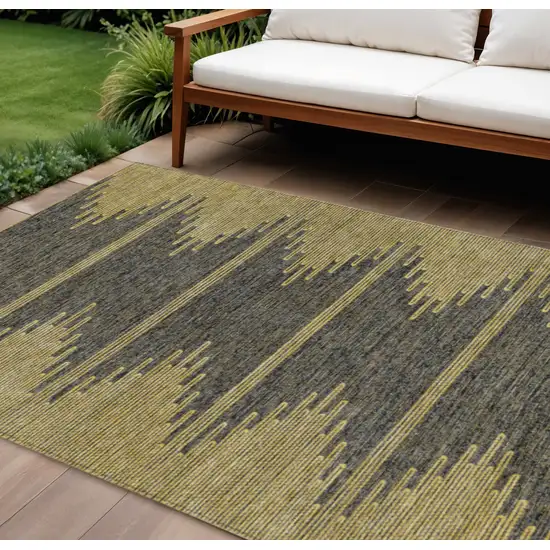 Dark Gray And Gold Abstract Washable Indoor Outdoor Area Rug Photo 1