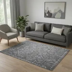 Photo of Dark Gray And Off White Tribal Distressed Area Rug