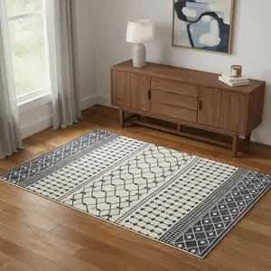 Photo of Dark Gray And White Geometric Distressed Washable Area Rug
