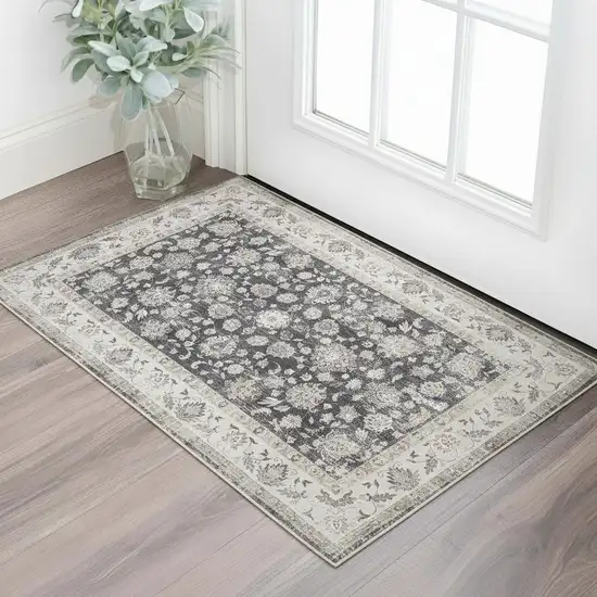 Dark Gray Light Gray And Ivory Oriental Distressed Washable Area Rug Photo 1