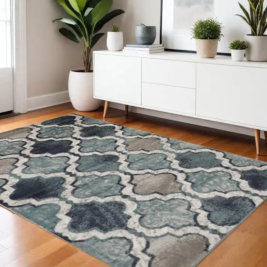 Gray And Ivory Quatrefoil Distressed Area Rug Photo 1