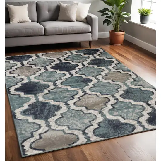 Gray And Ivory Quatrefoil Distressed Area Rug Photo 1