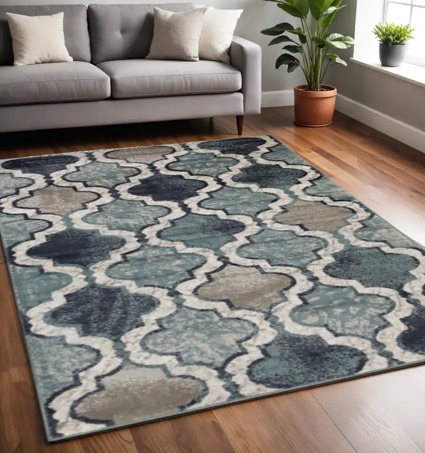 Gray And Ivory Quatrefoil Distressed Area Rug Photo 1