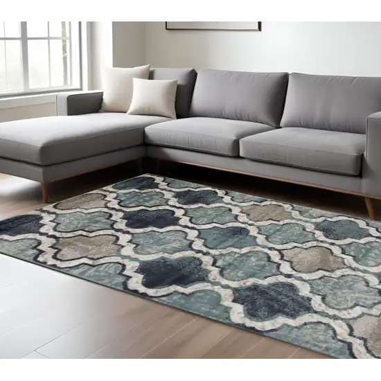 Gray And Ivory Quatrefoil Distressed Area Rug Photo 1