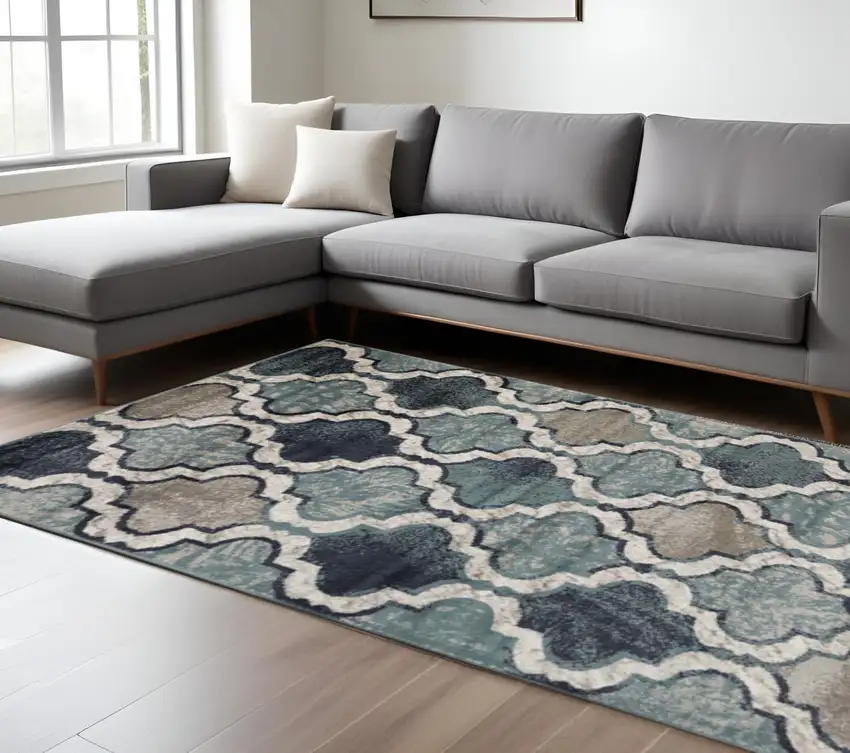 Gray And Ivory Quatrefoil Distressed Area Rug Photo 1