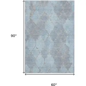 Photo of Denim Blue And Beige Damask Washable Area Rug With UV Protection