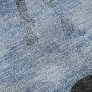 Photo of Denim Blue And Charcoal Animal Print Washable Area Rug With UV Protection
