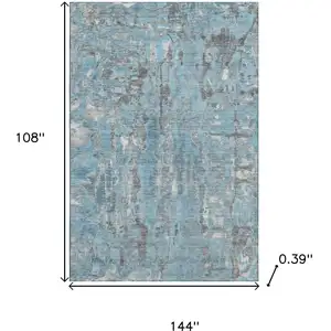 Photo of Denim Blue And Gray Abstract Washable Area Rug With UV Protection