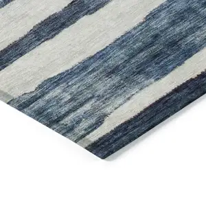 Photo of Denim Blue And Gray Striped Washable Indoor Outdoor Area Rug