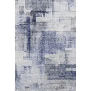 Photo of Denim Blue And Ivory Abstract Geometric Washable Area Rug With UV Protection