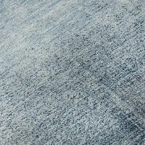 Photo of Denim Blue And Ivory Abstract Washable Area Rug With UV Protection