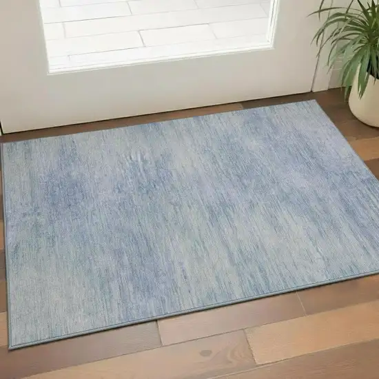 Denim Blue And Ivory Abstract Washable Area Rug With UV Protection Photo 1