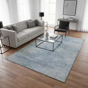 Photo of Denim Blue And Ivory Abstract Washable Area Rug With UV Protection