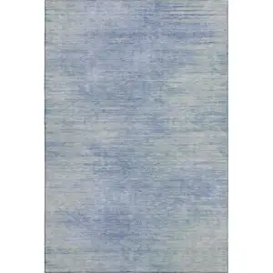 Photo of Denim Blue And Ivory Abstract Washable Area Rug With UV Protection