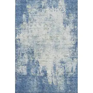 Photo of Denim Blue And Ivory Abstract Washable Area Rug With UV Protection