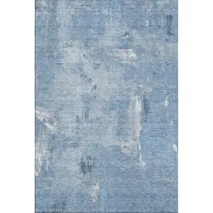 Photo of Denim Blue And Ivory Abstract Washable Area Rug With UV Protection
