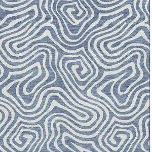 Photo of Denim Blue And Ivory Abstract Washable Area Rug With UV Protection