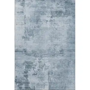 Photo of Denim Blue And Ivory Abstract Washable Area Rug With UV Protection