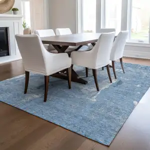 Photo of Denim Blue And Ivory Abstract Washable Indoor Outdoor Area Rug