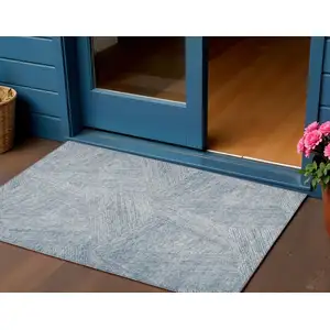 Photo of Denim Blue And Ivory Abstract Washable Indoor Outdoor Area Rug