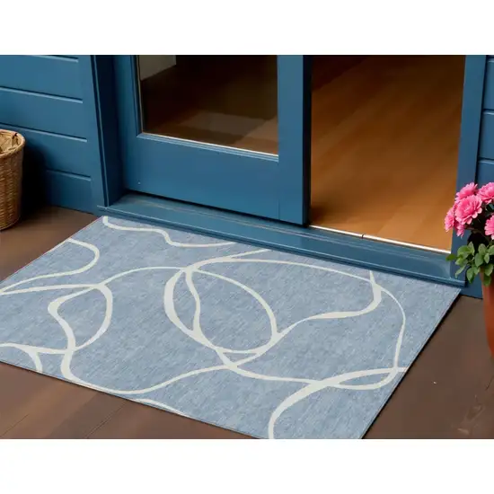 Denim Blue And Ivory Abstract Washable Indoor Outdoor Area Rug Photo 1