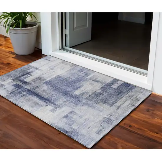 Denim Blue And Ivory Abstract Washable Indoor Outdoor Area Rug Photo 1
