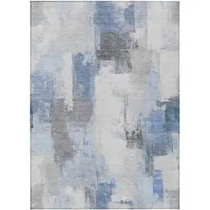 Photo of Denim Blue And Ivory Abstract Washable Indoor Outdoor Area Rug