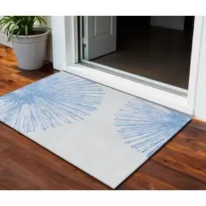 Photo of Denim Blue And Ivory Abstract Washable Indoor Outdoor Area Rug
