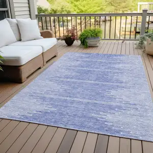 Photo of Denim Blue And Ivory Abstract Washable Indoor Outdoor Area Rug