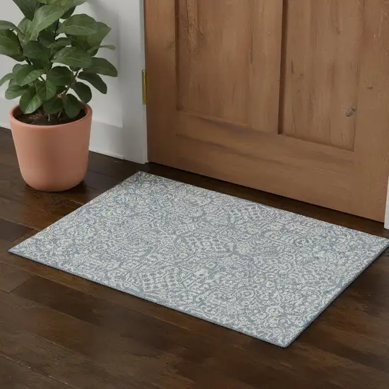 Denim Blue And Ivory Damask Washable Area Rug With UV Protection Photo 1