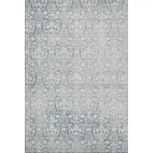 Photo of Denim Blue And Ivory Damask Washable Area Rug With UV Protection