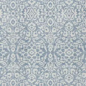 Photo of Denim Blue And Ivory Damask Washable Indoor Outdoor Area Rug