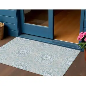 Photo of Denim Blue And Ivory Floral Medallion Washable Indoor Outdoor Area Rug