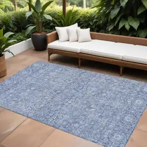 Photo of Denim Blue And Ivory Floral Washable Indoor Outdoor Area Rug