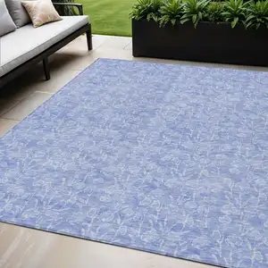 Photo of Denim Blue And Ivory Floral Washable Indoor Outdoor Area Rug