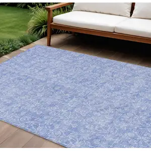 Photo of Denim Blue And Ivory Floral Washable Indoor Outdoor Area Rug