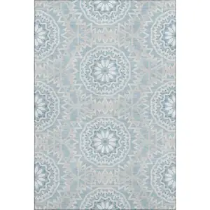 Photo of Denim Blue And Ivory Geometric Washable Area Rug With UV Protection