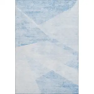Photo of Denim Blue And Ivory Geometric Washable Area Rug With UV Protection