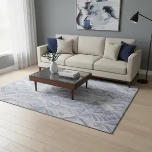 Photo of Denim Blue And Ivory Geometric Washable Area Rug With UV Protection