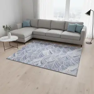 Photo of Denim Blue And Ivory Geometric Washable Area Rug With UV Protection