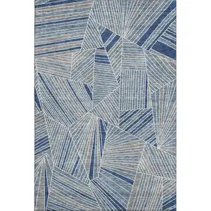 Photo of Denim Blue And Ivory Geometric Washable Area Rug With UV Protection