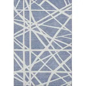 Photo of Denim Blue And Ivory Geometric Washable Area Rug With UV Protection