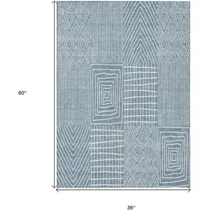 Photo of Denim Blue And Ivory Geometric Washable Indoor Outdoor Area Rug
