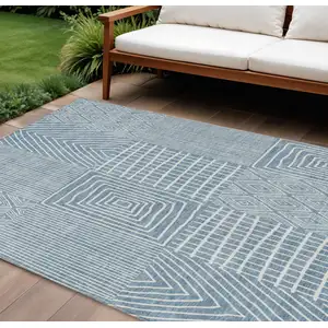 Photo of Denim Blue And Ivory Geometric Washable Indoor Outdoor Area Rug