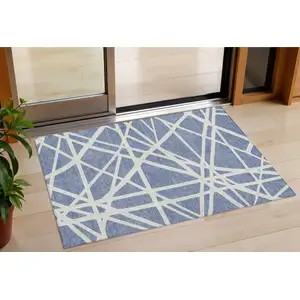 Photo of Denim Blue And Ivory Geometric Washable Indoor Outdoor Area Rug