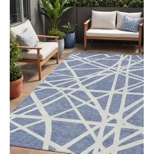 Photo of Denim Blue And Ivory Geometric Washable Indoor Outdoor Area Rug