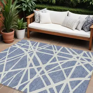 Photo of Denim Blue And Ivory Geometric Washable Indoor Outdoor Area Rug
