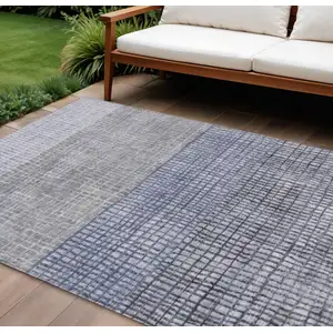 Photo of Denim Blue And Ivory Geometric Washable Indoor Outdoor Area Rug